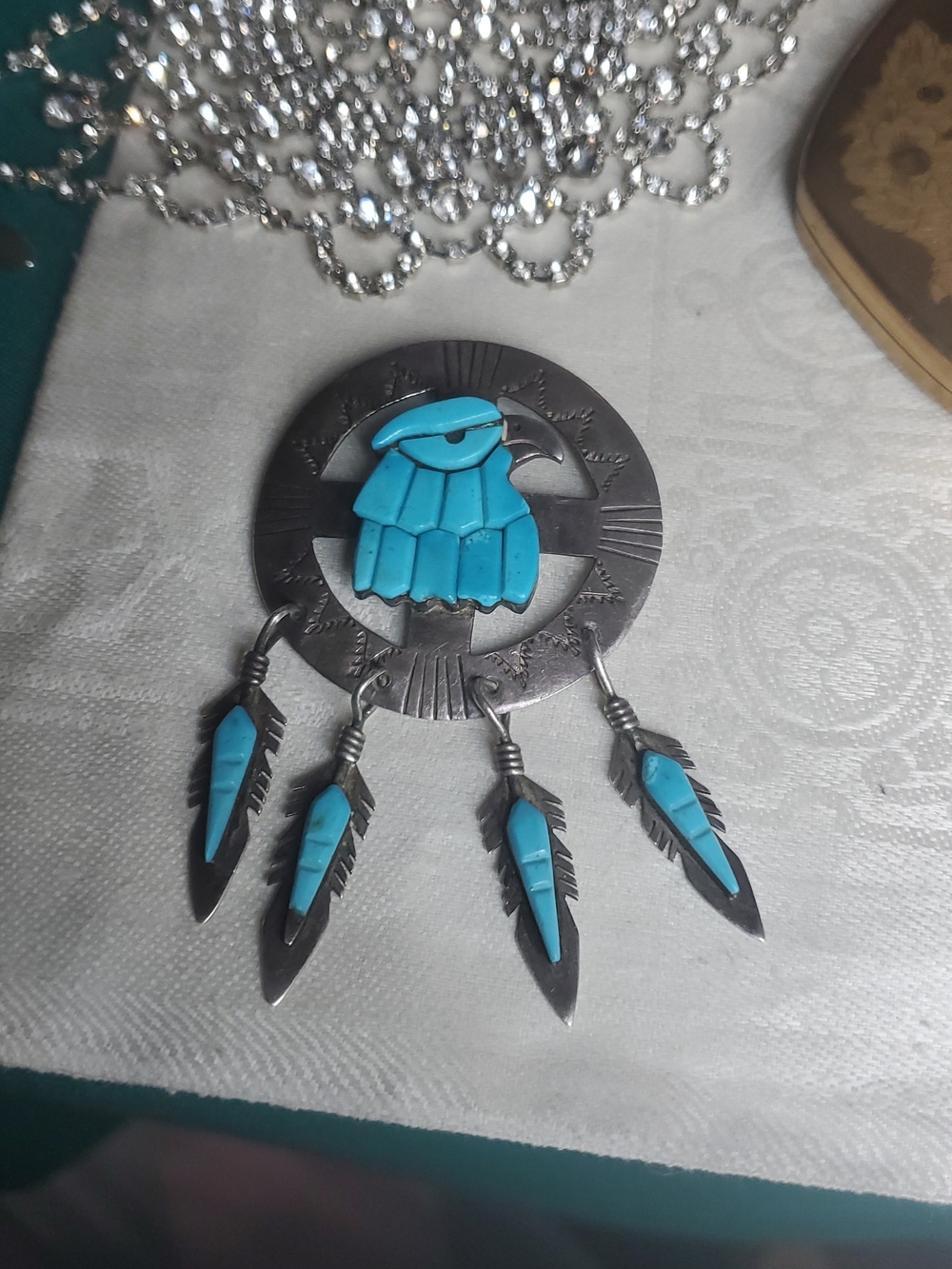 Medicine wheel eagle and feather pendant made with sterling silver and turquoise